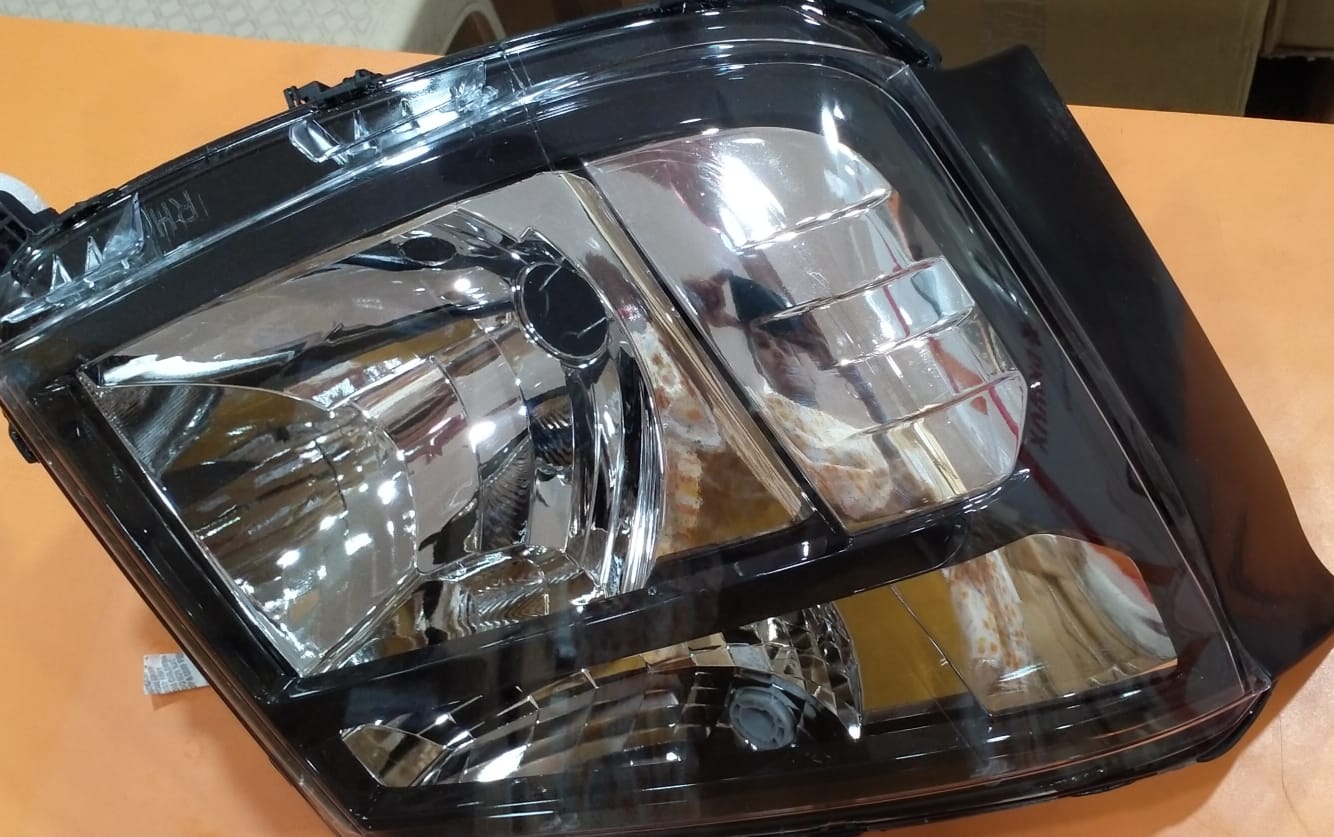 UNO MINDA HEAD LAMP UNIT BLACK BZL TTA INTRA RH