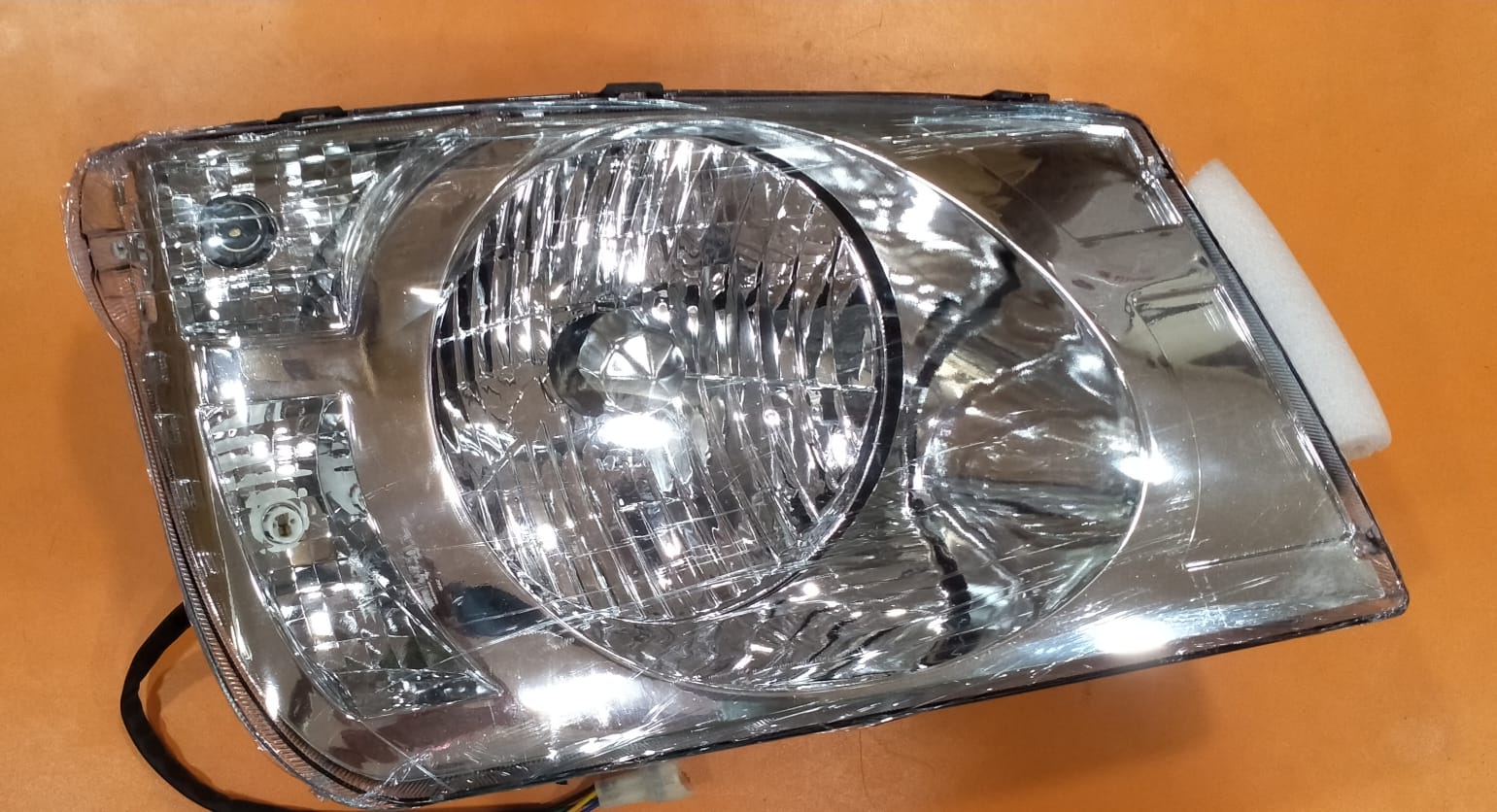 UNO MINDA HEAD LIGHT WIR BOLERO T-2-RH