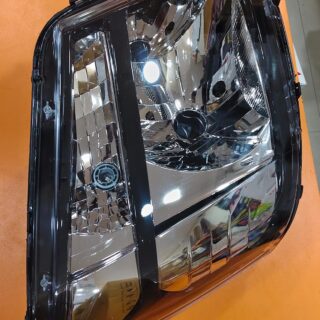 UNO MINDA TATA INTRA  BLACK   BEZEL- RH HEAD LIGHT ASSEMBLY